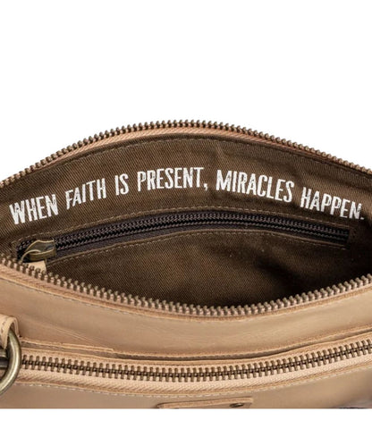 Close-up view of the interior quote that reads: "When Faith Is Present, Miracles Happen."