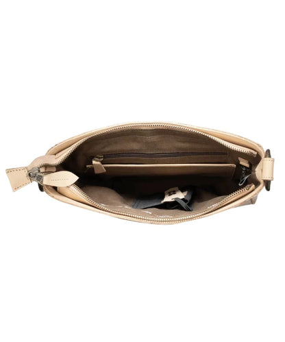 Interior view of the main zip compartment featuring the concealed carry pocket and a zip pocket