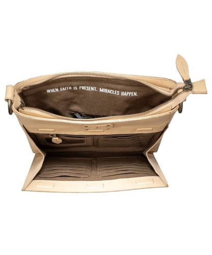 Interior view of the magnetic front pocket featuring 1 interior zip pocket, 1 ID slot, and 12 card slots