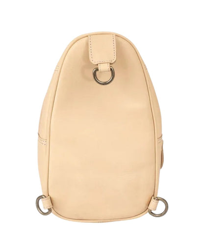 Back view of the women's beige leather sling bag featuring the multi-directional adjustment d-rings