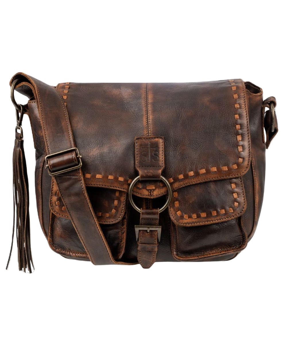 Front view of the women's chocolate STS Bandera Saddle Hobo Bag featuring the flap closure with decorative buckle, whipstitch accents, decorative leather tassel, and an adjustable wide leather shoulder strap