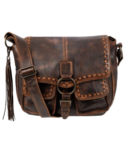 Front view of the women's chocolate STS Bandera Saddle Hobo Bag featuring the flap closure with decorative buckle, whipstitch accents, decorative leather tassel, and an adjustable wide leather shoulder strap