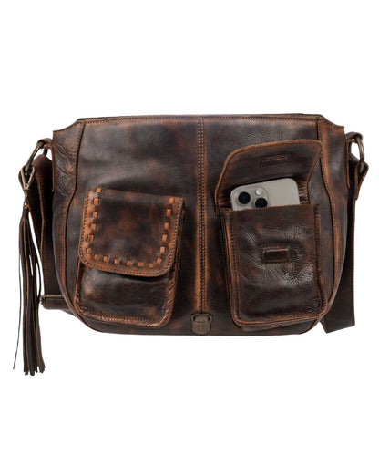 Front view of the women's chocolate leather hobo bag featuring the magnetic flap pockets under the flap closure