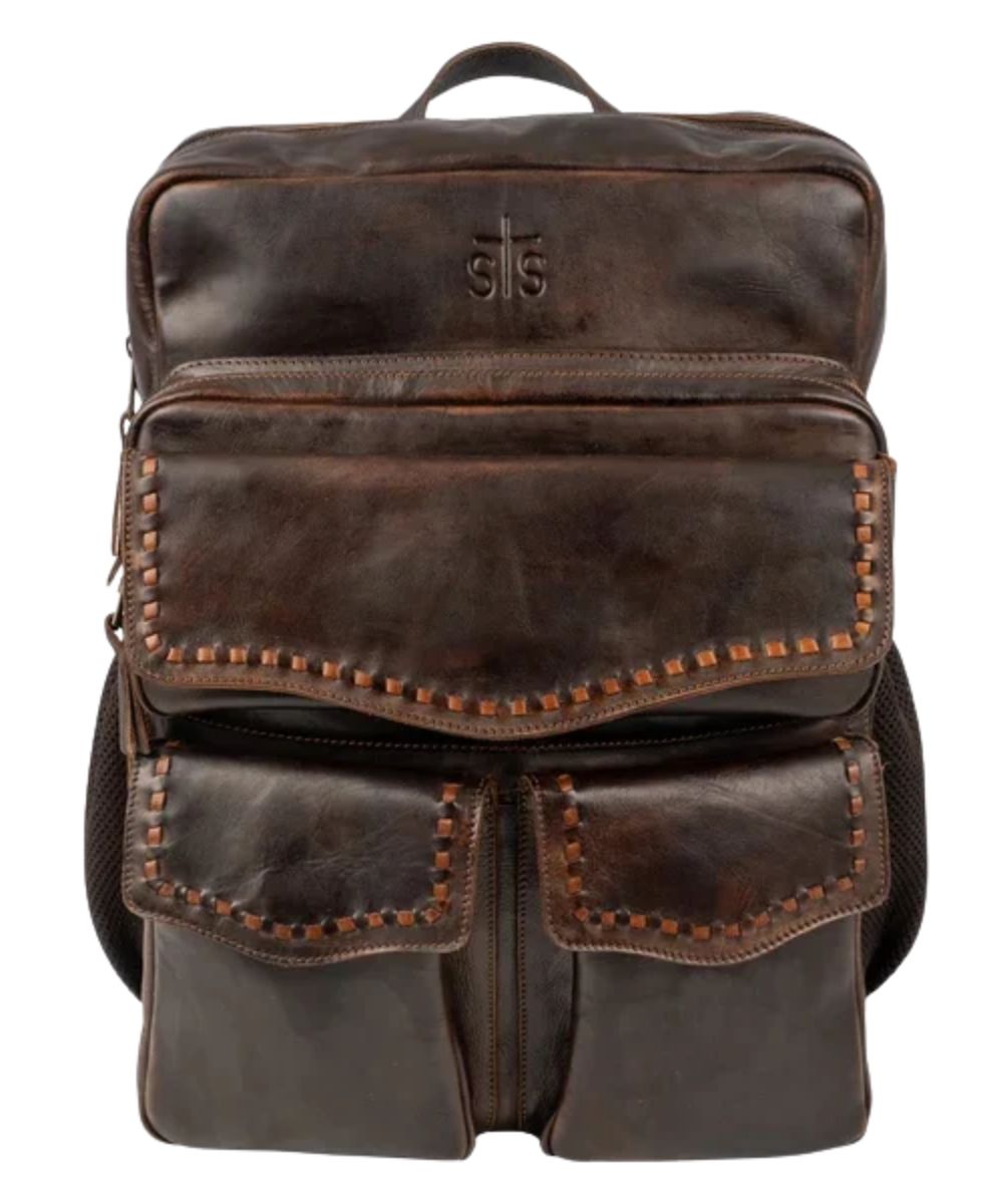 Front view of the women's STS Bandera Chocolate Backpack featuring the buckstitch trim, top carry handle, front organizational pockets, and side mesh pockets