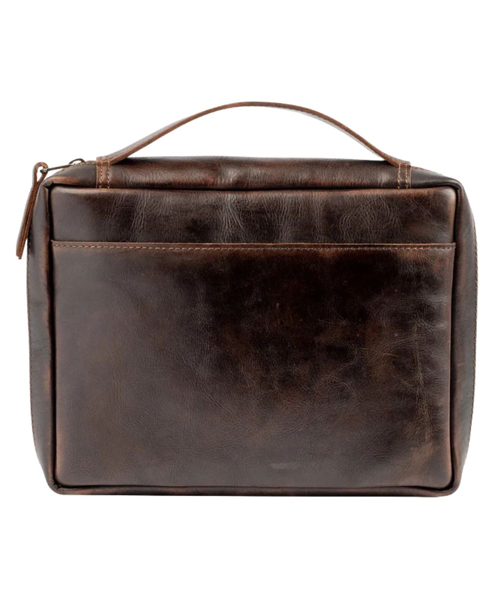 Back view of the chocolate brown bible cover featuring the top leather carry handle, zip closure, and an exterior back slip pocket