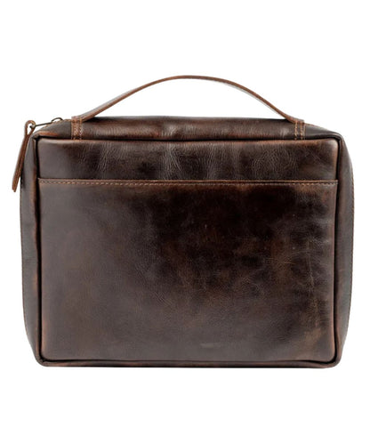 Back view of the chocolate brown bible cover featuring the top leather carry handle, zip closure, and an exterior back slip pocket