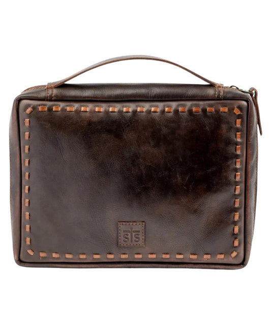 Front view of the STS Bandera Chocolate Bible Cover featuring the STS branded leather patch, buckstitch trim, leather construction, and a leather top carry handle