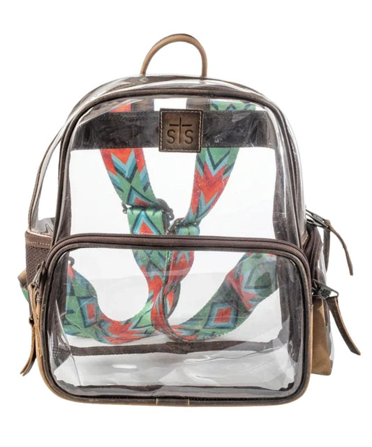 Front view of the women's clear STS Stadium Rules Backpack featuring the clear vinyl construction, brown leather trim, STS leather logo patch, rolled leather top carry handle, front and side zipper compartments, and a mesh side pocket