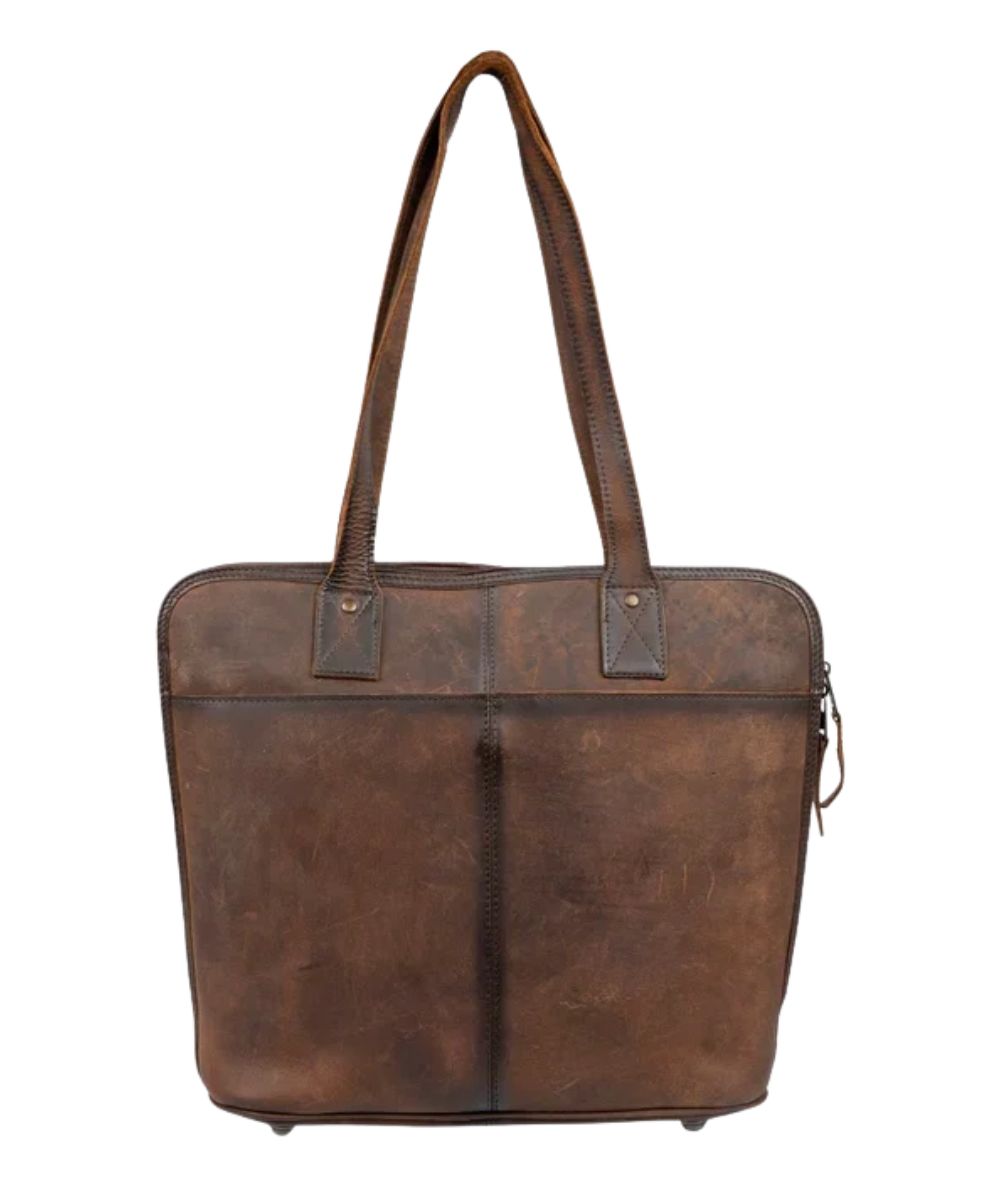 Back view of the dark brown leather laptop bag featuring the exterior snap closure slip pocket, and the metal feet on the bottom for protection and stability