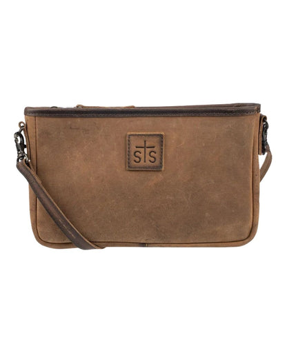 Front view of the women's brown STS Baroness Claire Crossbody featuring the genuine leather construction, STS branded leather patch, and an adjustable/removable leather crossbody strap