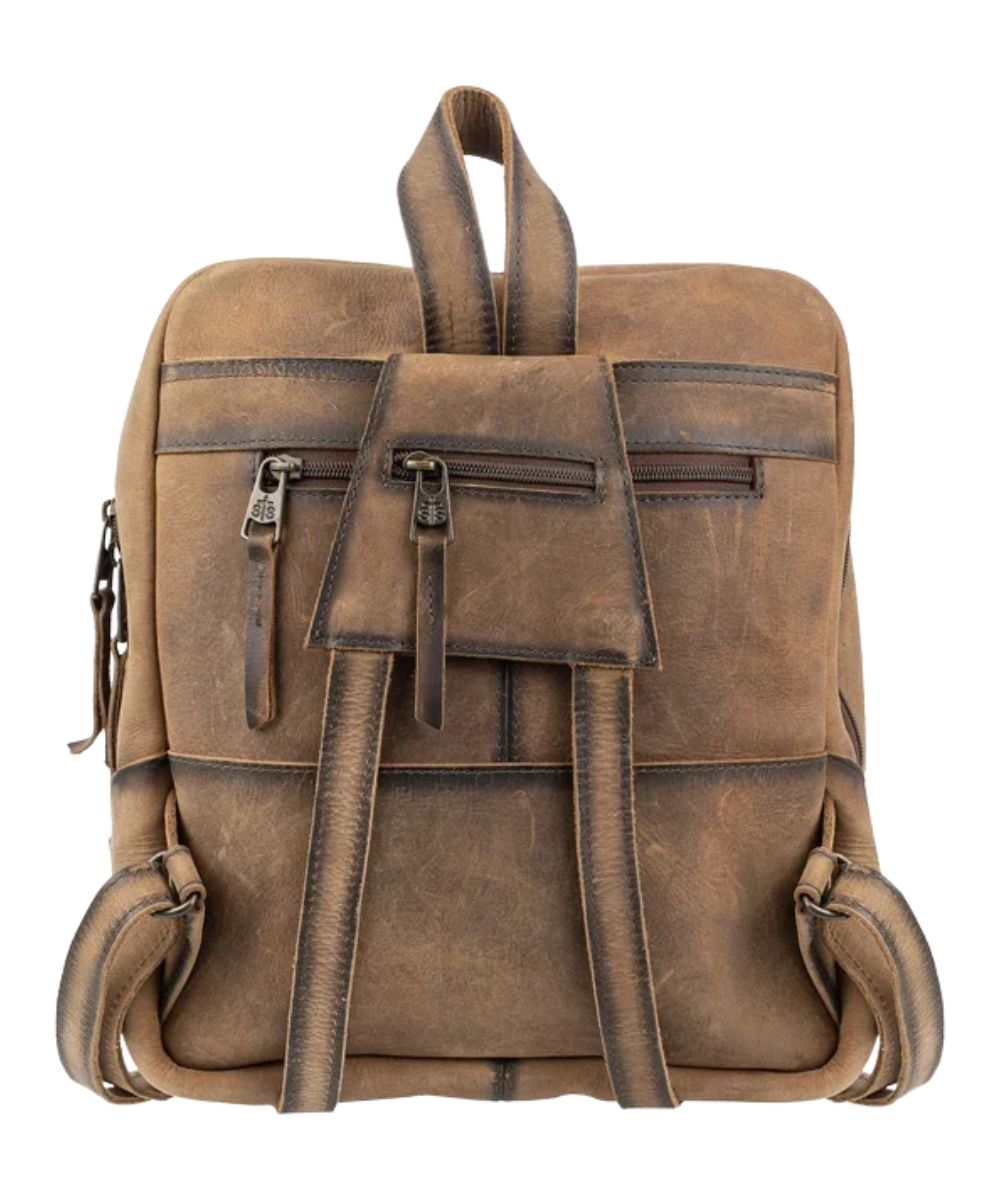 Back view of the brown leather mini backpack featuring the adjustable backpack straps with a zipper pocket and an exterior back zipper pocket