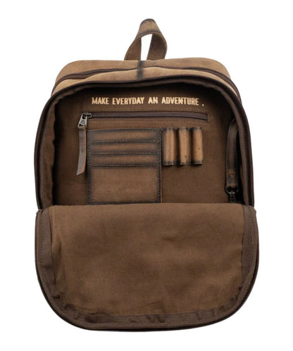 Interior view of the front zip pocket featuring the interior zip pocket, pen slots, card slots, keychain clasp, and a quote that reads: "Make Everyday An Adventure."