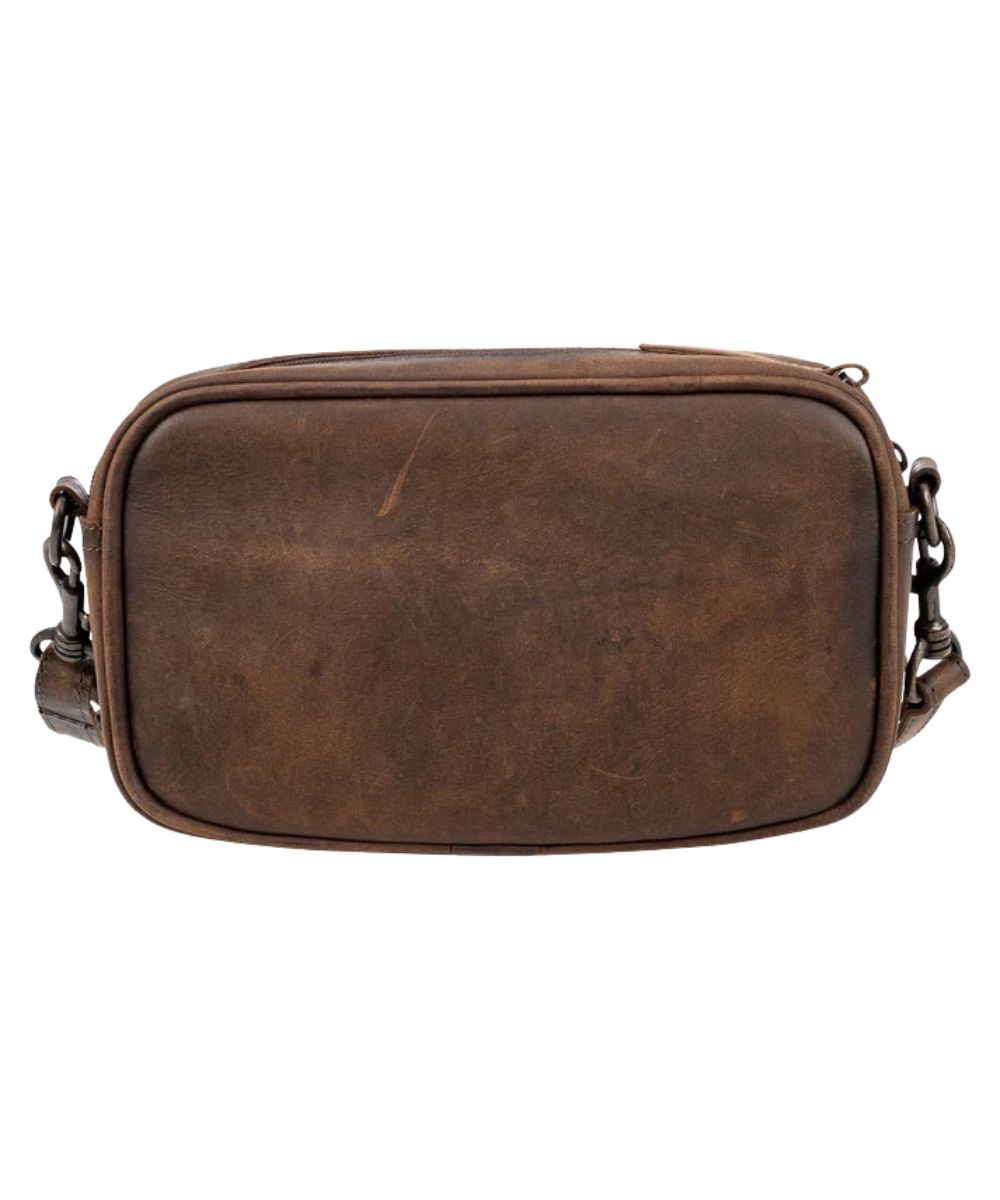 Back view of the women's brown leather crossbody bag featuring the solid brown back
