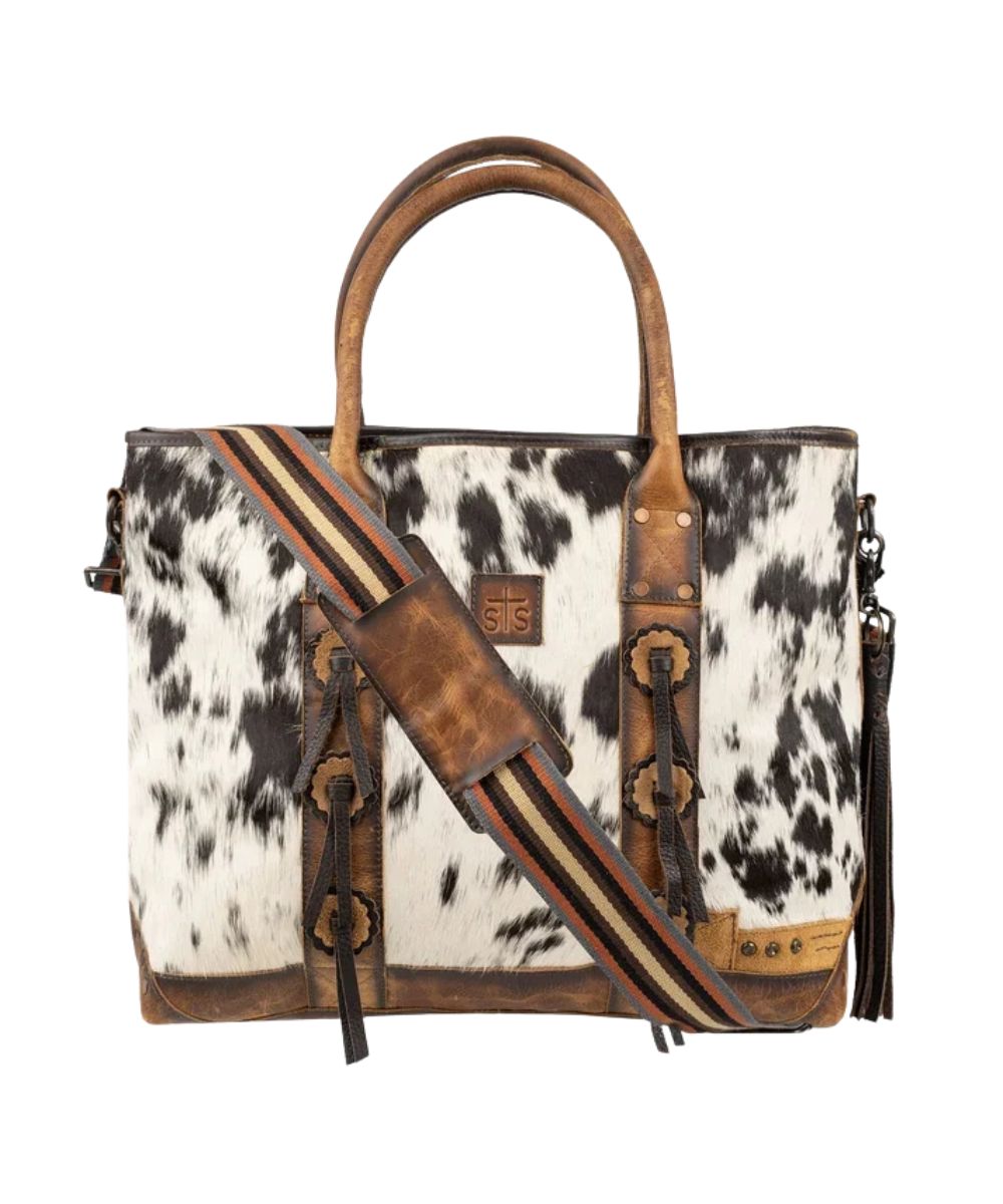 Front view of the women's brown leather cowhide tote featuring the removable/adjustable nylon strap with a leather shoulder pad