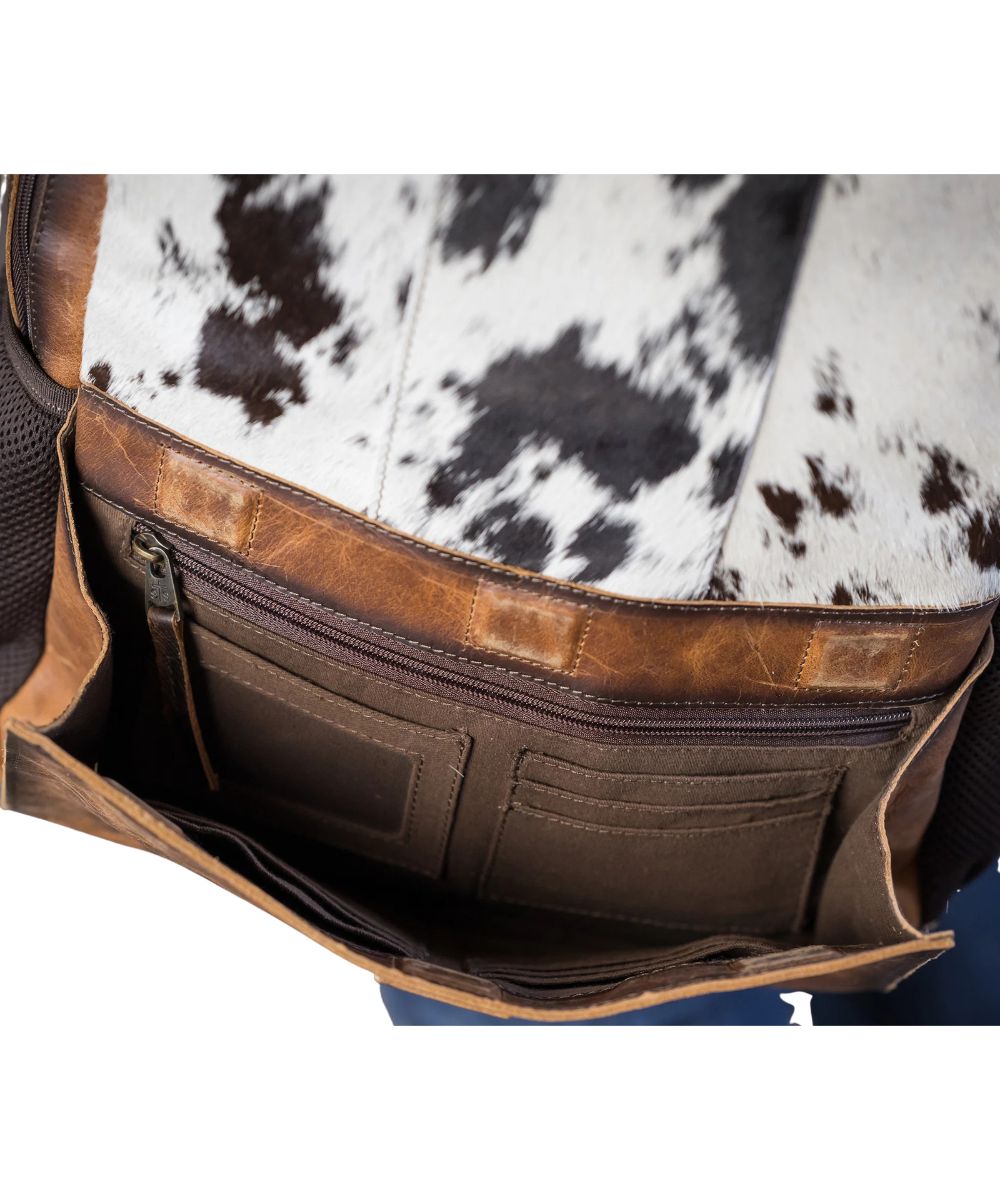 Close-up view of the front magnetic pocket featuring an ID slot, zip pocket, and 9 card slots