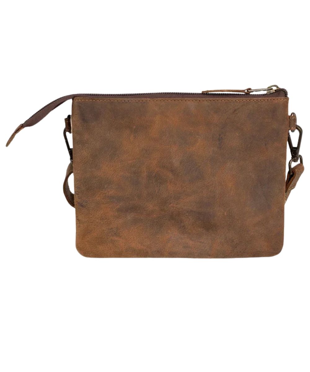 Back view of the women's crossbody featuring the dark brown solid leather back