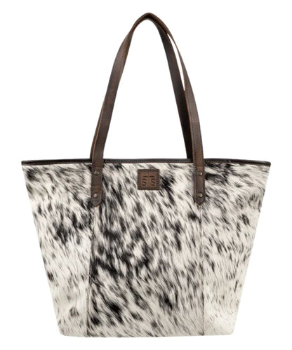 Front view of the women's brown STS Cowhide Laptop Tote featuring the dual leather carry handles, STS branded leather, and the hair-on-hide front