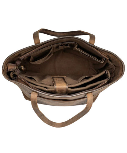 Interior view of the women's cowhide laptop tote featuring the slip pockets, pen slots, and the removable padded laptop holder