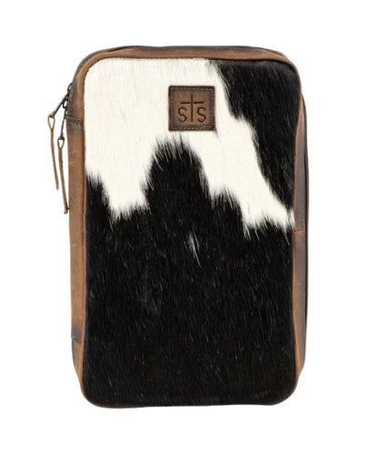 Front view of the women's dark brown STS Cowhide Squash Jewelry Case featuring the hair-on-hide front with an STS leather patch