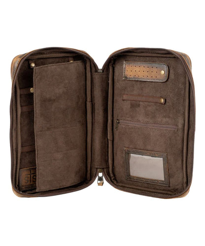 Interior view of the women's cowhide jewelry case featuring the ID slot, earring holder, and the zip pocket