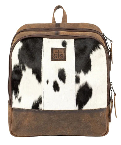 Front view of the women's brown STS Cowhide Mini Backpack featuring the hair-on-hide front, zip closures, and a leather top carry handle