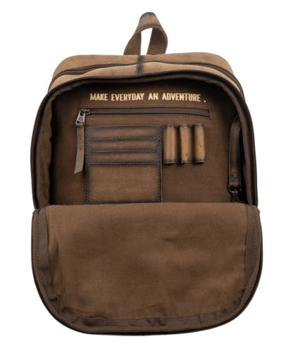 Interior view of the women's cowhide backpack featuring the interior zip pocket, 3 pen slots, 4 card slots, inside quote that reads: "Make Everyday An Adventure." and a keychain clasp