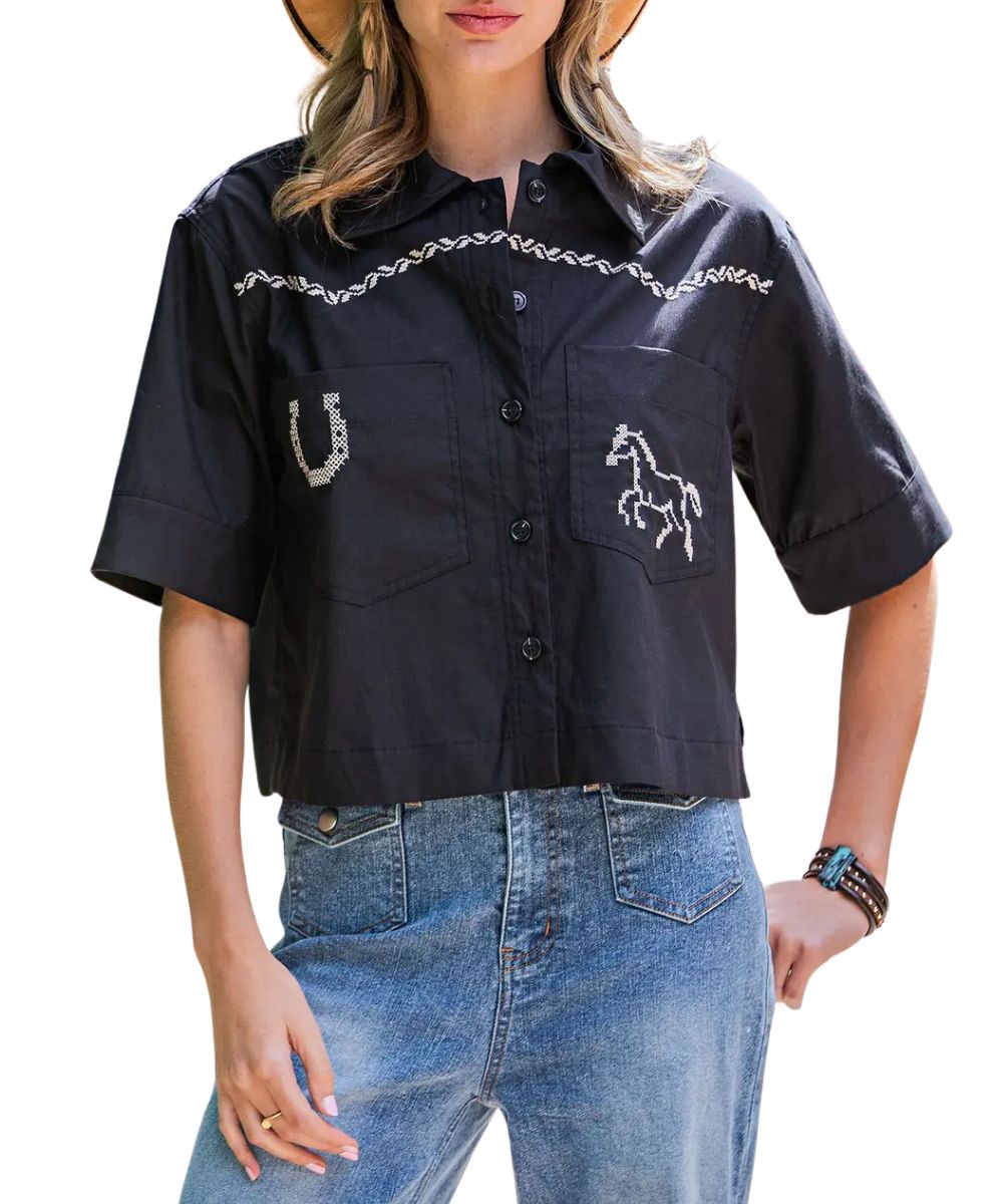Front view of the women's Eesome black short sleeve button down blouse featuring the patch chest pockets with horse and horseshoe intricate stitched embroidery, and the decorative wavy stitching across the chest