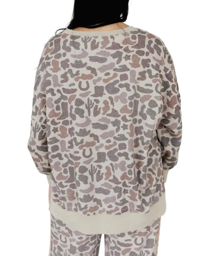 Back view of the women's western camo printed long sleeve sweatshirt featuring the neutral incorporated western motifs of cacti, horseshoes, and steer horns in taupe, gray, and beige