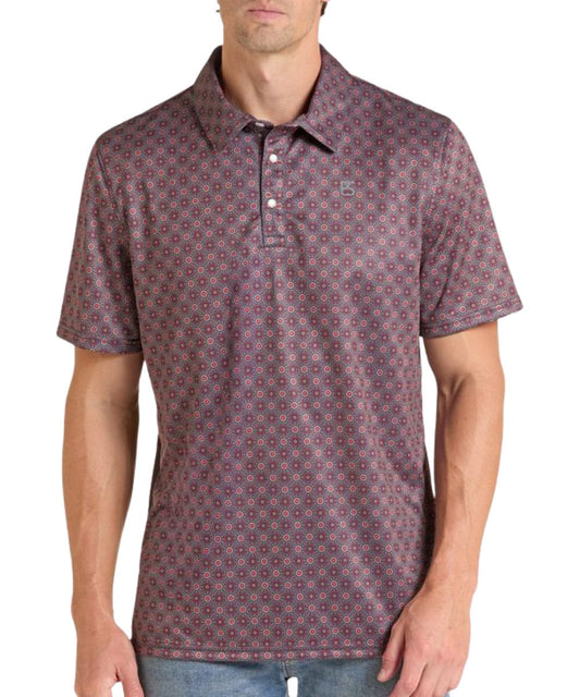 Front view of the men's black medallion print performance polo snap shirt