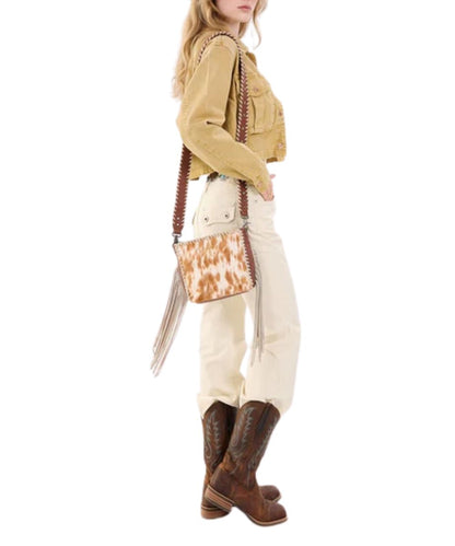 Model View Of The Cowhide Purse With A Detachable Crossbody Strap