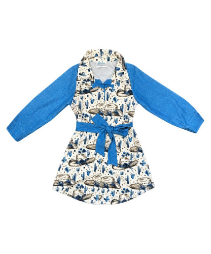 Flat lay view of the girl's long sleeve pearl snap dress