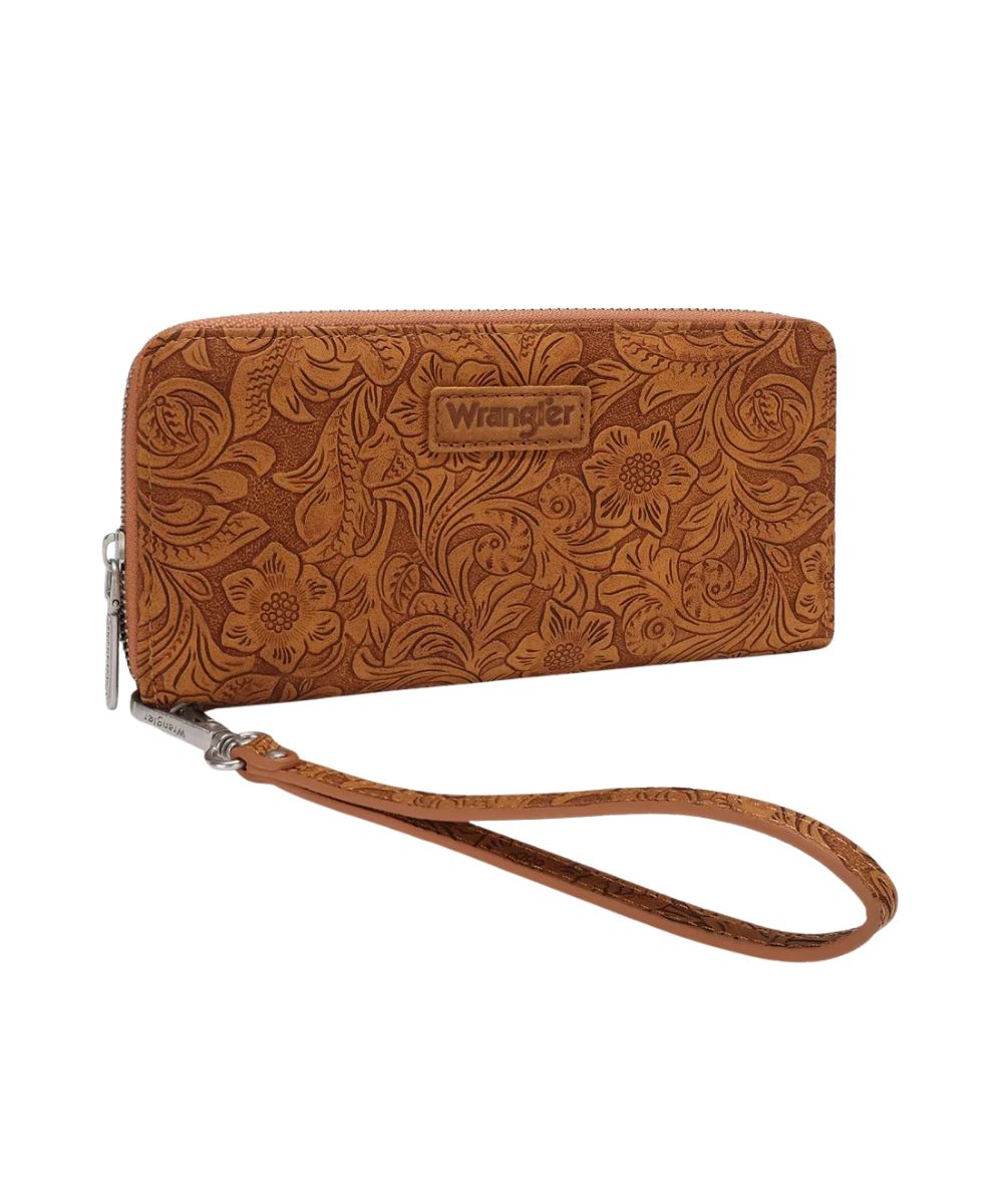 Front view of the women's brown faux leather Wrangler wallet featuring the floral tooled design front and a removable wristlet strap