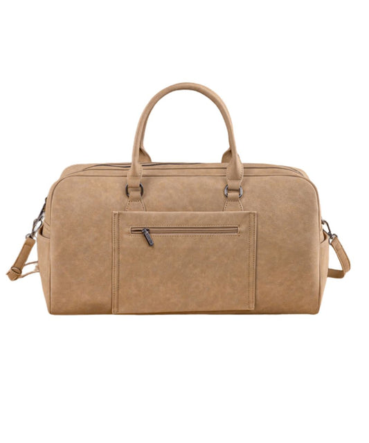 Back view of the women's tan faux leather weekender bag featuring the zipper pocket on the back with a trolley sleeve, top carry handles, and a removable/adjustable crossbody strap