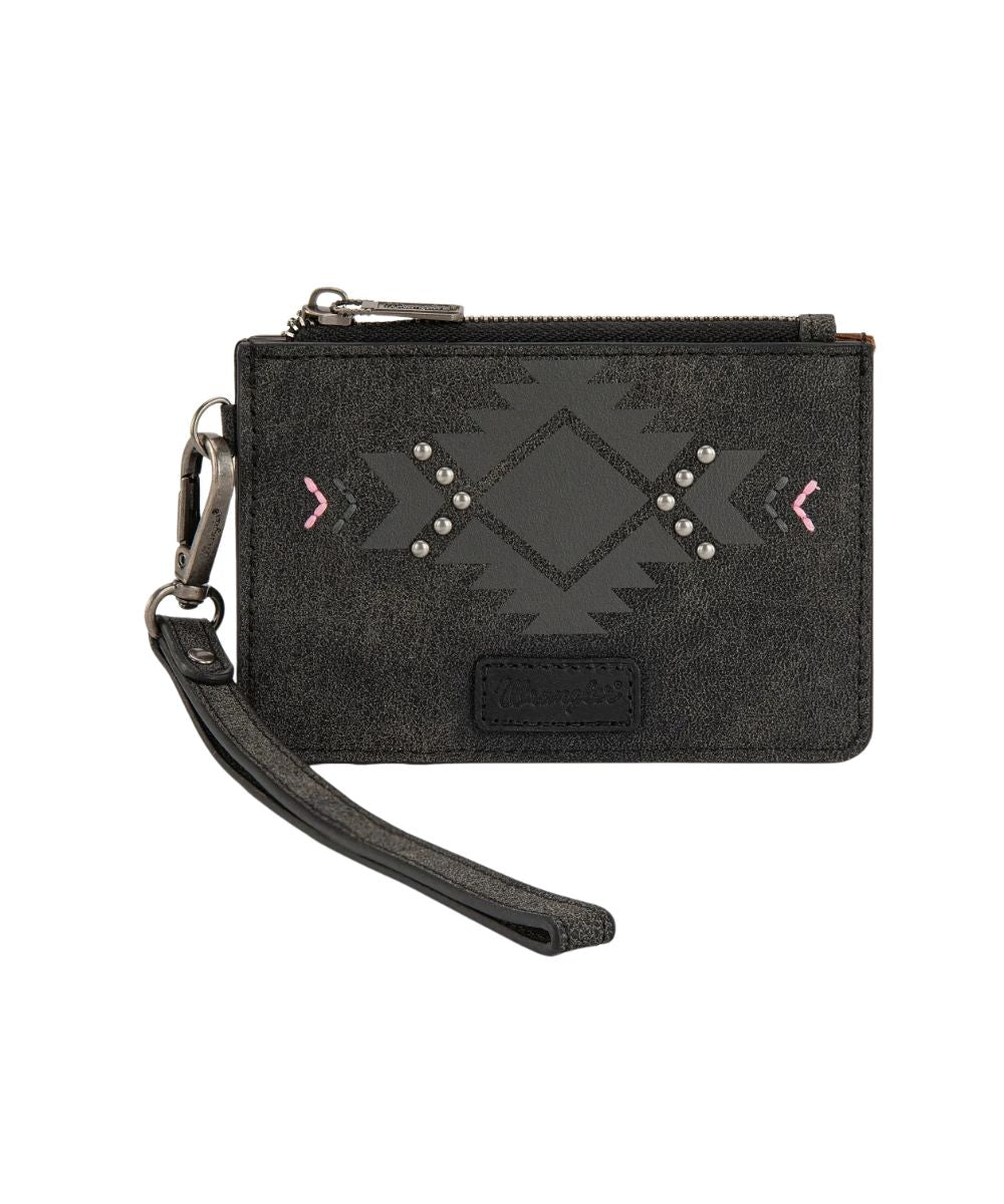 Front view of the women's black faux leather Wrangler card case wallet featuring the aztec design on the front with silver studs and pink accents, Wrangler logo patch, top zipper closure, and a removable wristlet strap