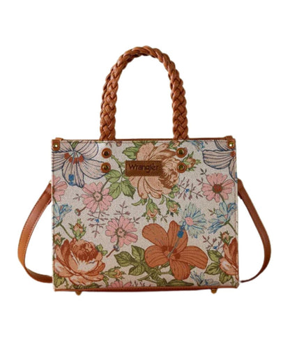 Front view of the women's brown handbag featuring a floral canvas front