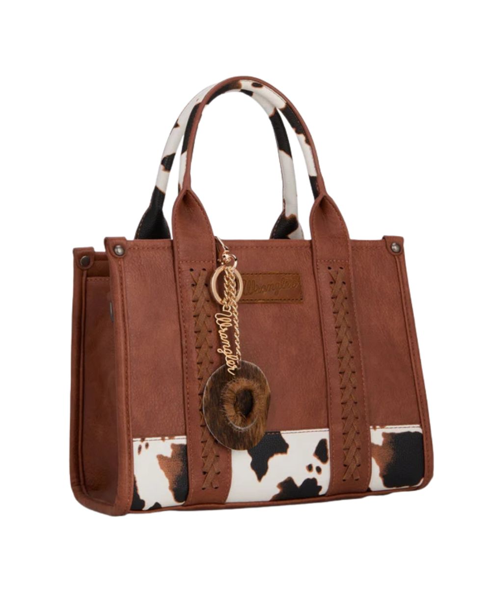 western purse charm on brown purse with a white background