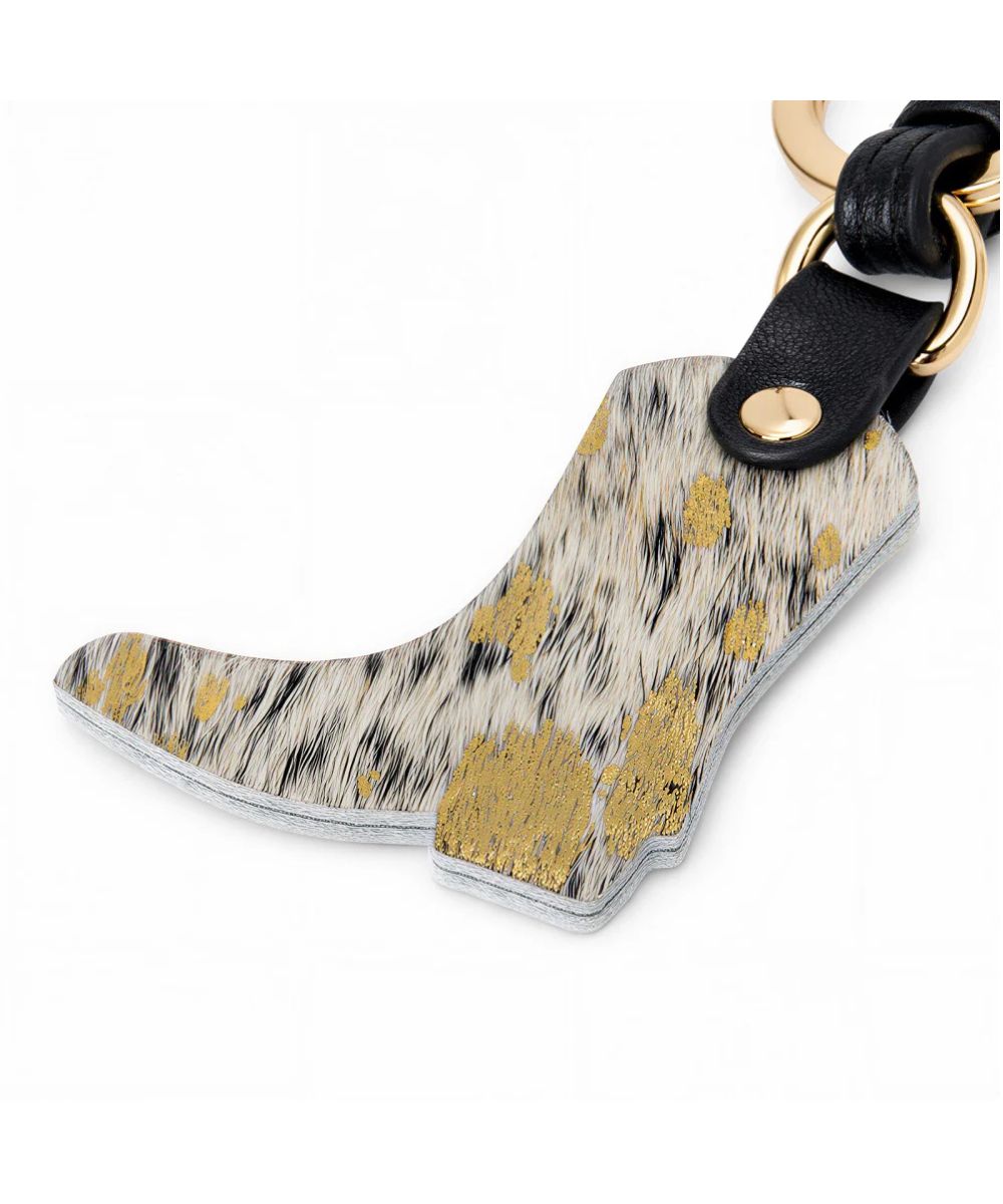 black cowhide boot charm on a white background