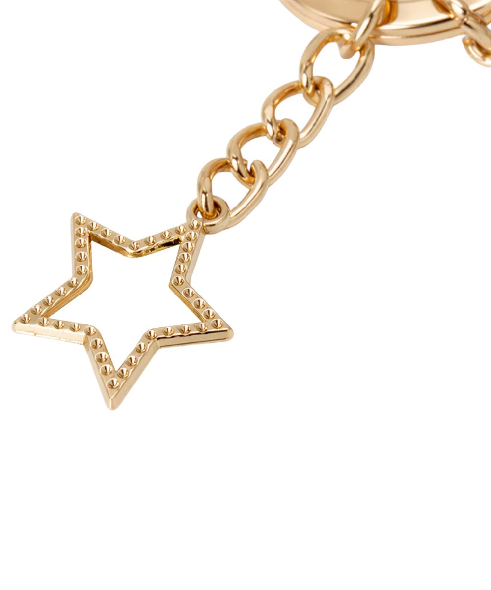 Gold bracelet with a star-shaped charm on a white background