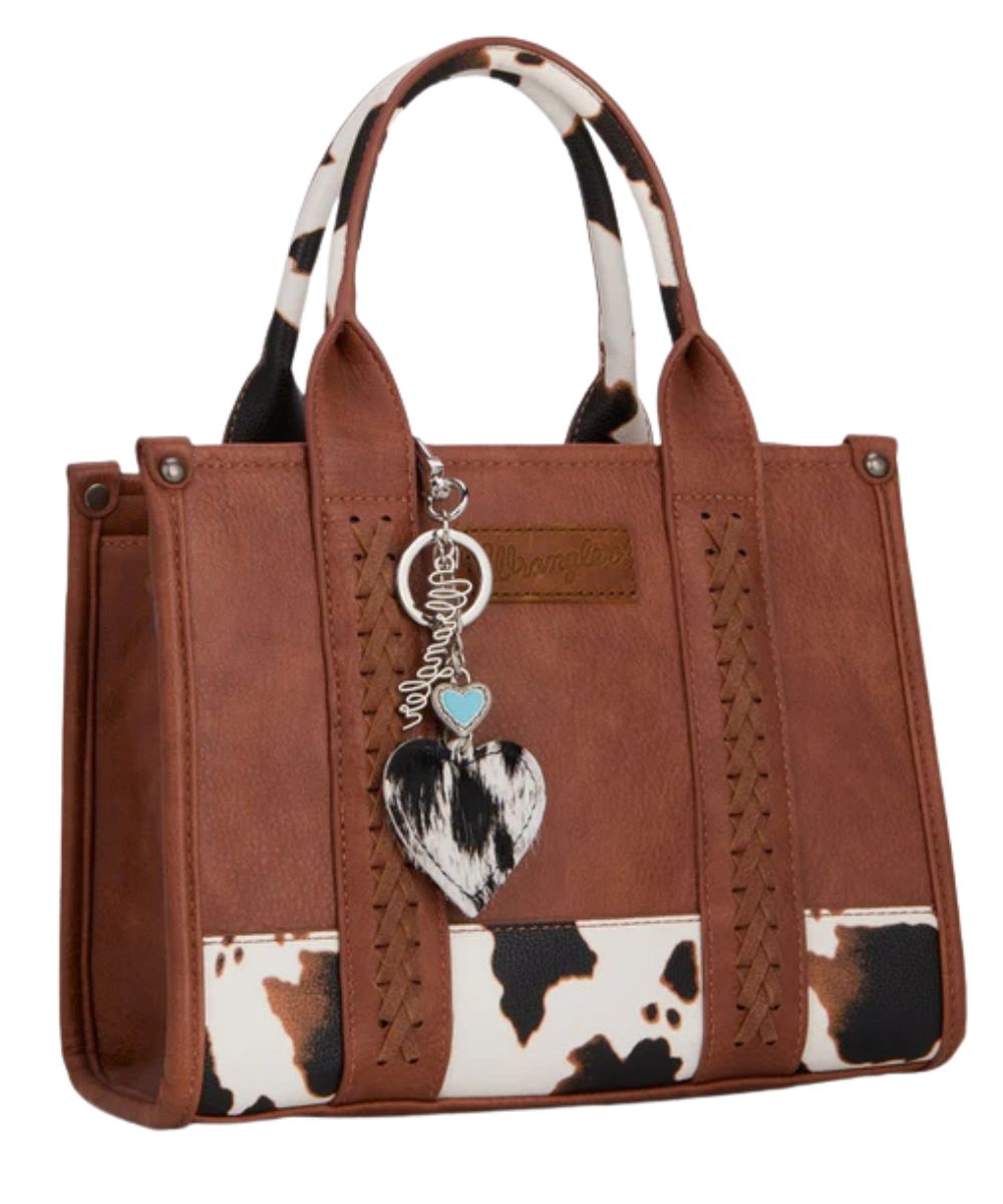 Model view of the silver chain black hair-on heart bag charm modeling on a bag, bag not included