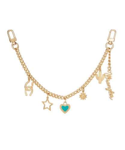 Side view of the light gold multi-charm bag chain featuring the western-themed charms