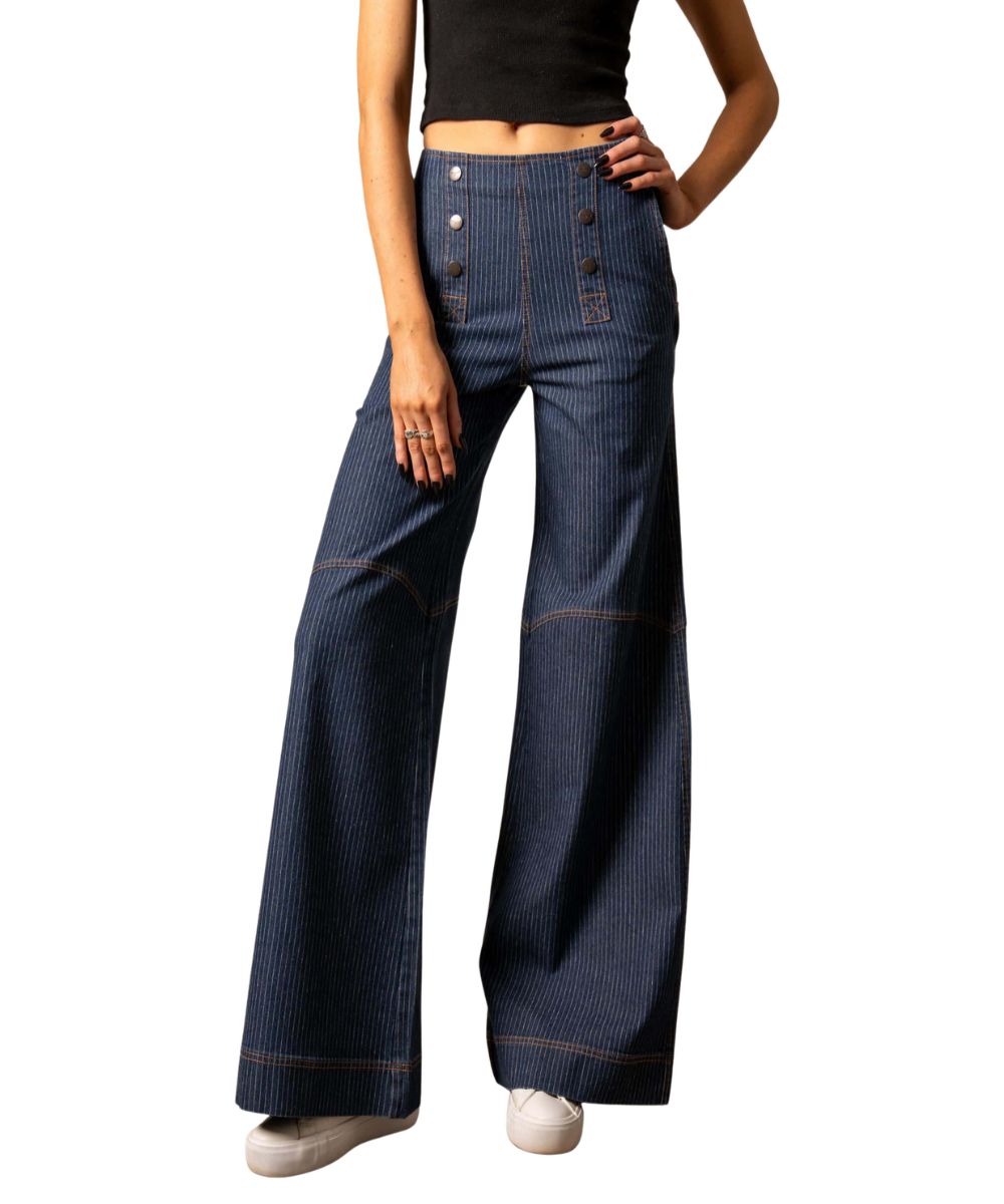 Front view of the women's dark wash Kimes Ranch Wide Leg Sofie Jean featuring the high rise, double faux button plackets on the front panel, side seam hand pockets, seam detailing at the knee, wide leg, trouser hem, and mini vertical stripe print