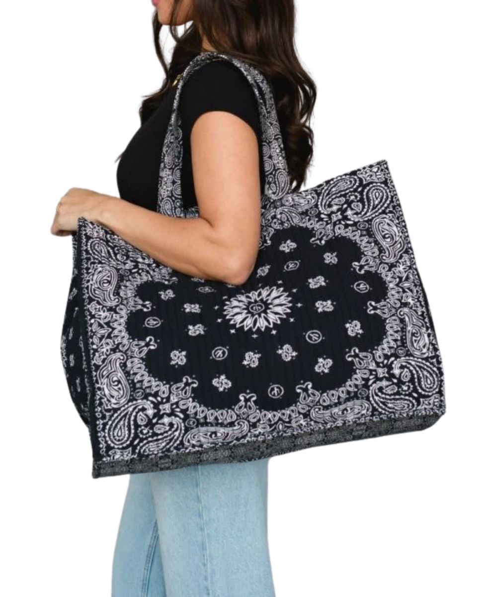 Panache Apparel women's black quilted paisley bandana printed tote bag with a spacious interior and shoulder straps, can be used as a weekender bag