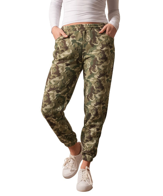 Front view of the women's camouflage Kimes Ranch Page Pants featuring the elastic waistband, jogger-style, cozy fabric, hand pockets, and elastic ankle cuffs