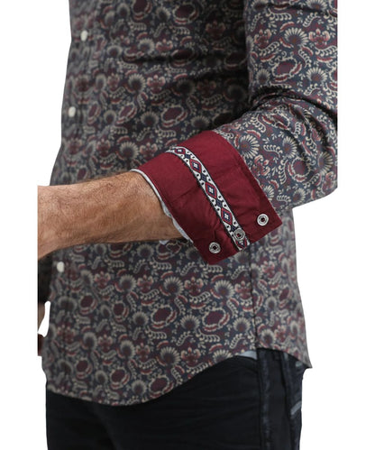 Close-up view of the contrast interior trim and stylized leaf/eye motif print with diamond shapes and botanical focus