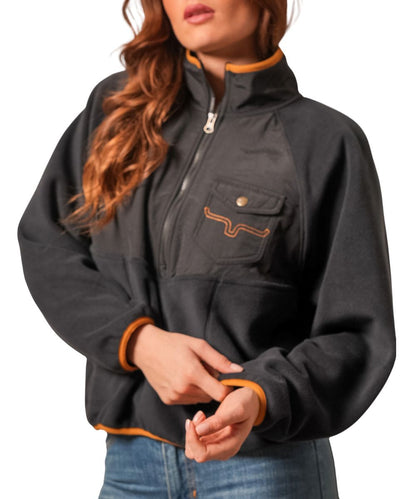Front view of the women's black Kimes Ranch 1/2 pullover featuring the mock neck, single snap flap chest pocket with longhorn logo embroidery, color blocked yokes, and contrast elasticized trim