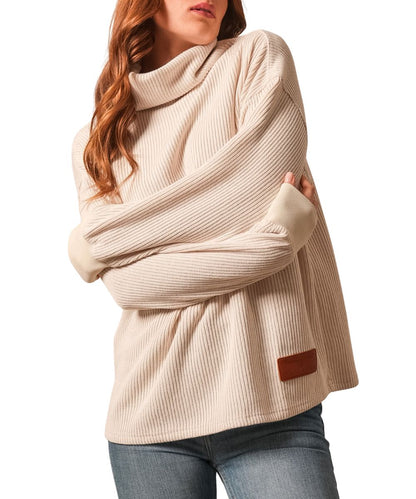 Front view of the women's natural Kimes Ranch Maren Sweater featuring the relaxed oversized fit, long relaxed sleeves, dropped shoulders, cowl neck, logo patch at the hem, and soft rib knit fabric