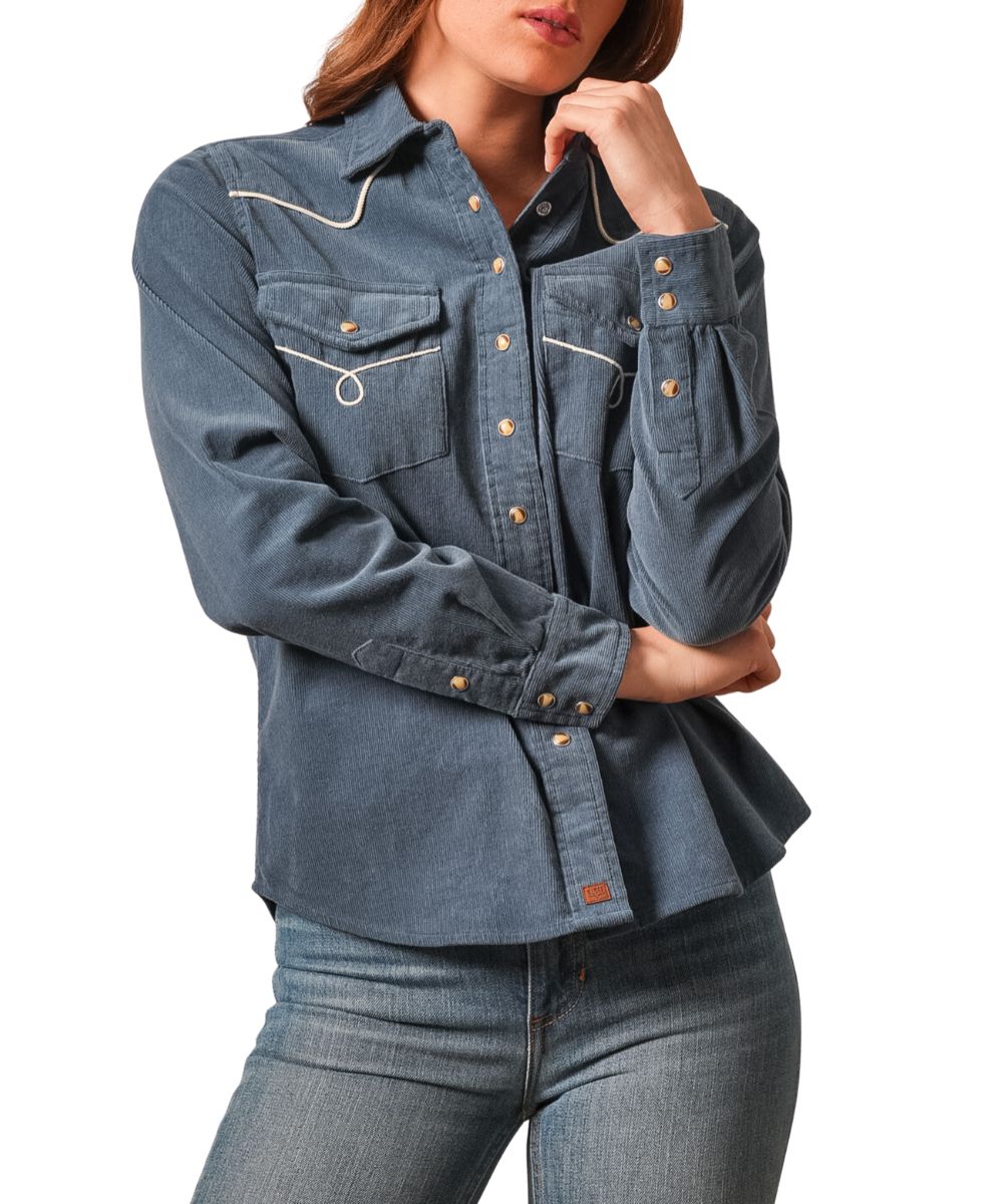 Front view of the women's dark blue Kimes Ranch Lahi Snap Shirt featuring the blue velveteen fabric, tailored fit, spread collar, chest pockets, western yokes, pearl snaps, and contrast piping at the yokes and pockets