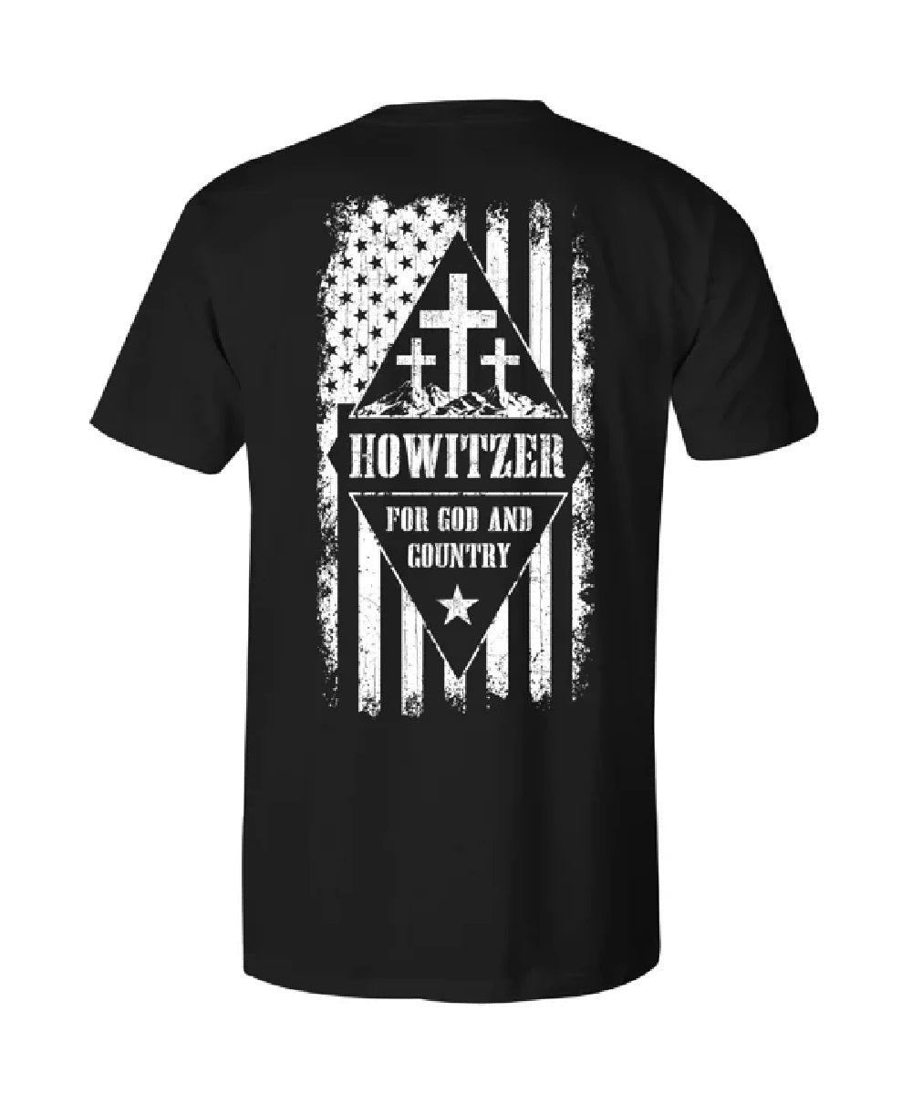 Back view of the men's black short sleeve Howitzer graphic tee featuring the screen printed American Flag on the back with three crosses set in the mountains and text that reads: "Howitzer For God And Country"