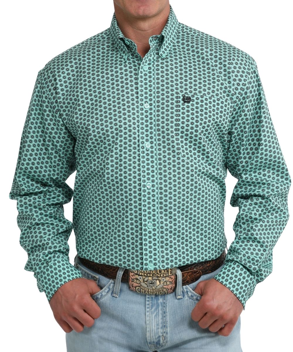 Front view of cinch long sleeve turquoise and black floral print button down shirt with single chest pocket