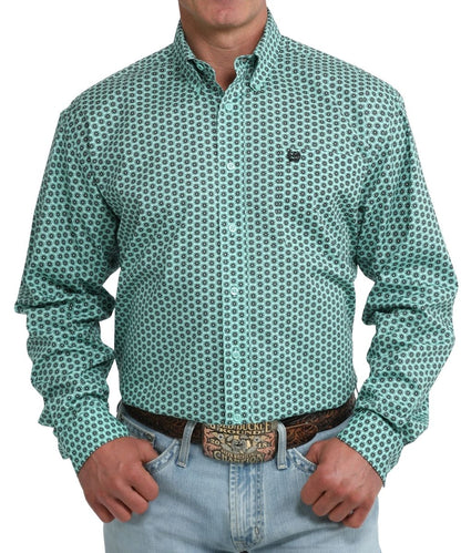 Front view of cinch long sleeve turquoise and black floral print button down shirt with single chest pocket